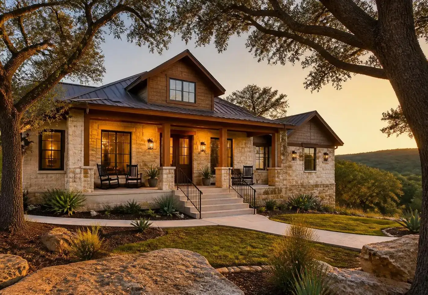 Custom stone and cedar home built in the Texas hill country at golden hour